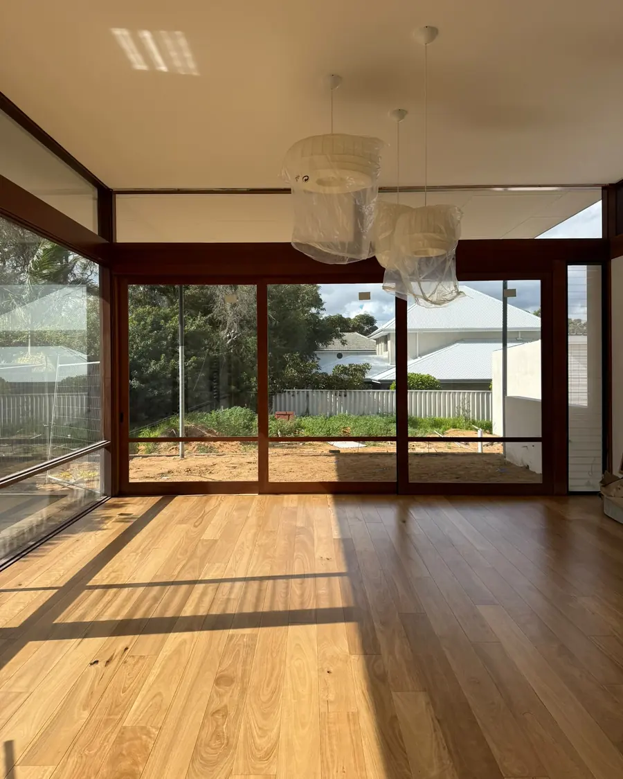 Timber flooring through a light-filled Perth living room