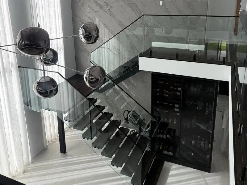 Timber staircase with glass balustrade in a Perth home
