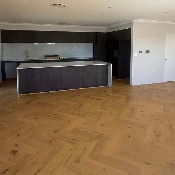 Living area after — timber flooring installed