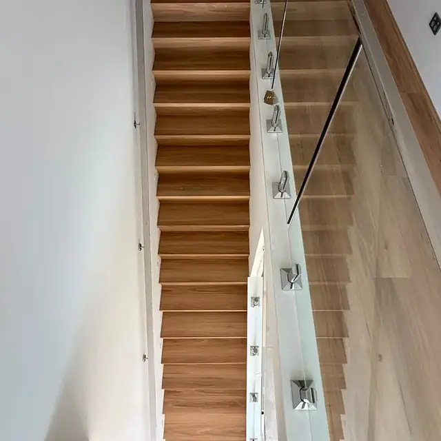 Timber staircase treads and risers finished to match the floor