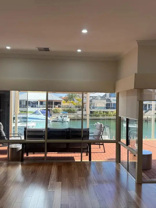 Timber flooring in a riverside Perth living room with water views