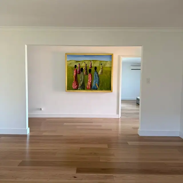 Engineered timber flooring through an open living and dining space