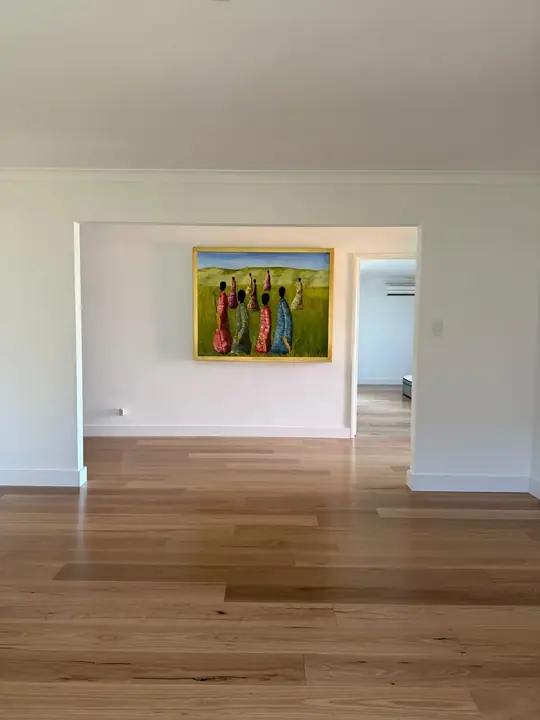 Engineered timber flooring through an open living and dining space
