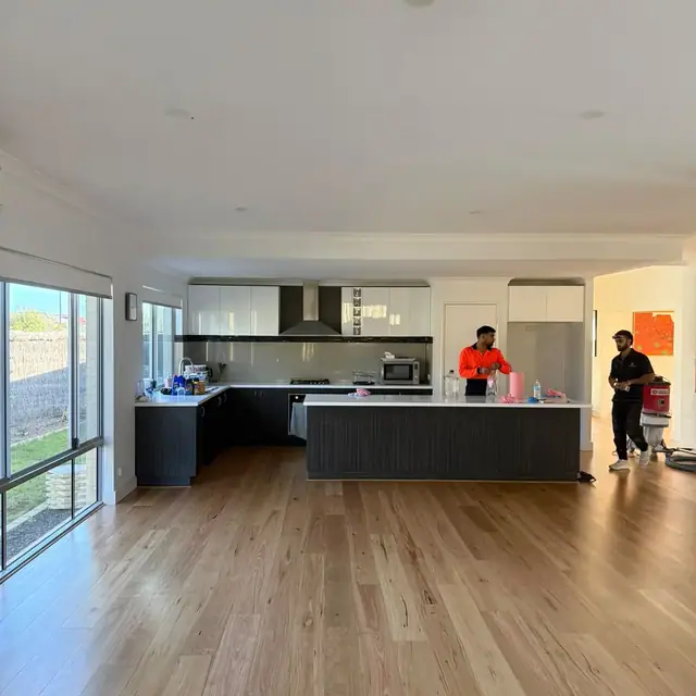 Engineered timber flooring through an open kitchen and living area in Butler