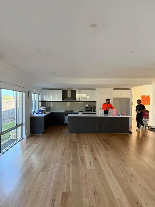 Engineered timber flooring through an open kitchen and living area in Butler
