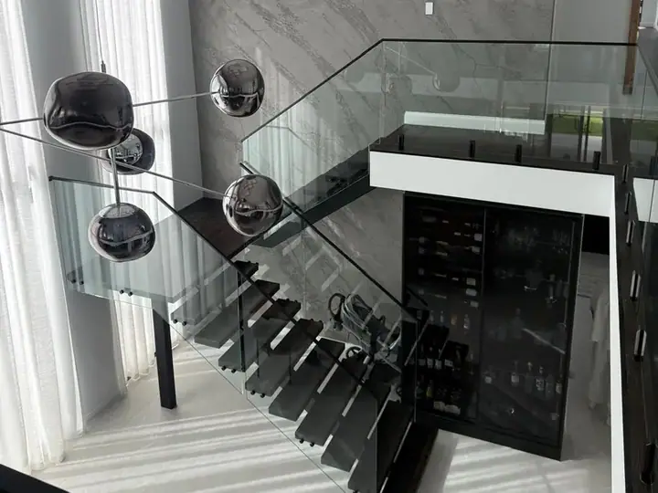 Timber staircase with glass balustrade in a Perth home